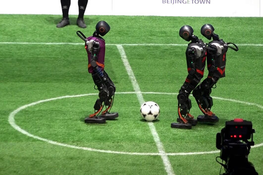 O arranque da Liga de futebol de robôs humanoides 3 contra 3 em Pequim 