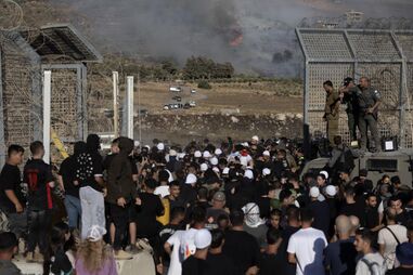 Dezenas de drusos israelitas atravessaram a fronteira para ajudar os 'irmãos' sírios