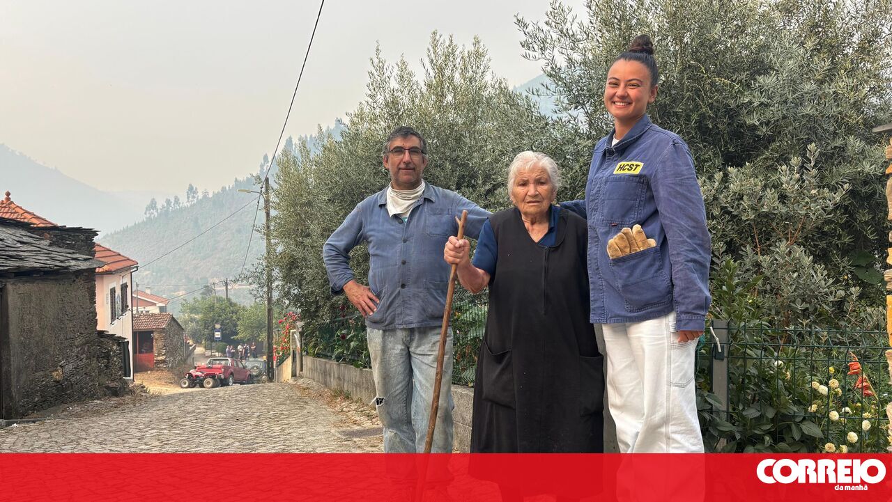 Residents Stand Ready with Hoses as Wildfire Threatens Their Village in Arganil