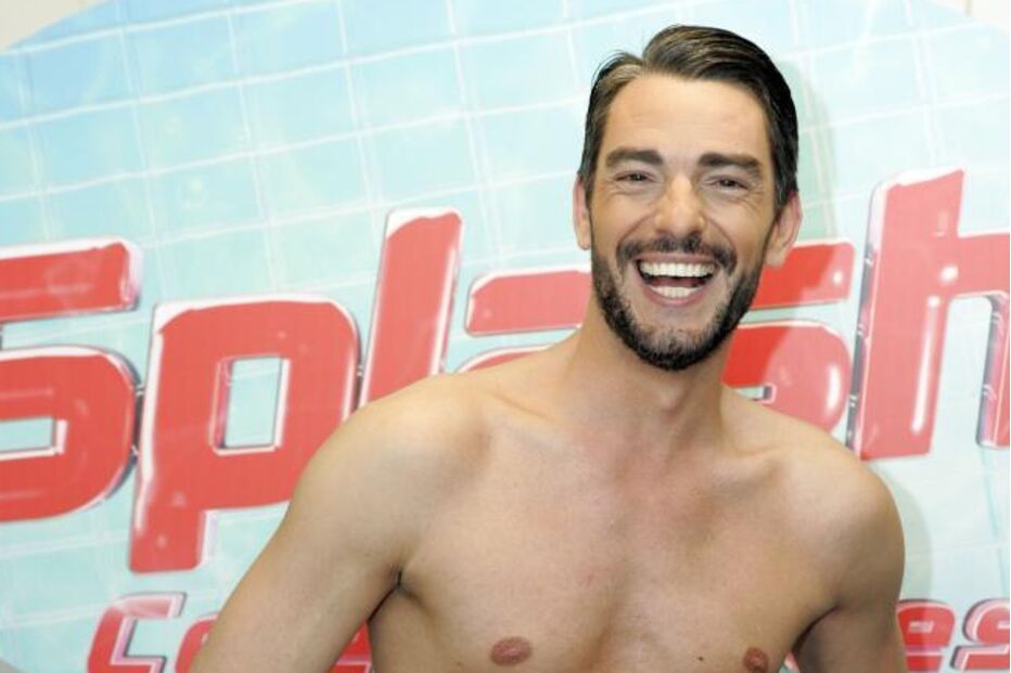 O nadador alemão Massimiliano Cavallari sorri ao posar para 