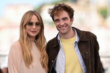 Jennifer Lawrence serviu comida do lixo a Robert Pattinson