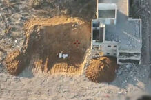 Imagens divulgadas mostram Hamas a enterrar corpos que Israel diz ser de reféns 