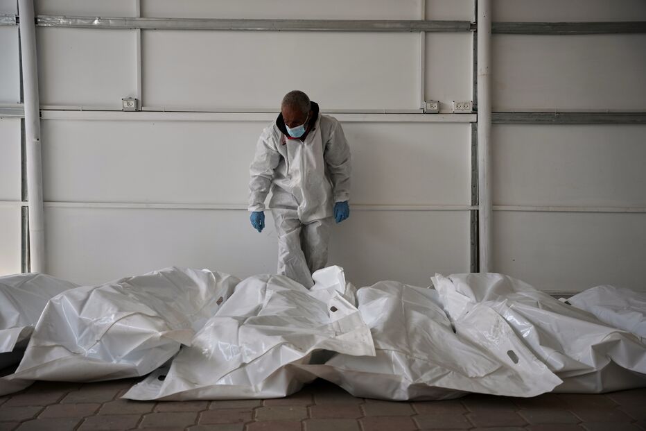 Corpos entregues por Israel em sacos brancos