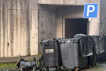 Zona de condicionamento de lixo parcialmente destruída pelas chamas