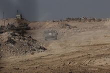 Militares israelitas na ‘zona amarela’, para onde se retiraram após o cessar-fogo 