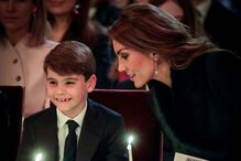 Kate Middleton e o príncipe Louis na missa de Natal, em Westminster