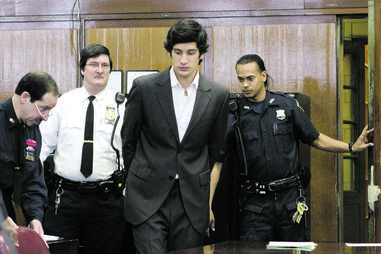 Renato em tribunal. Foi condenado a prisão perpétua, mas pode sair em 2036 