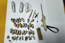 Apreensão de droga e acessórios relacionados com o consumo