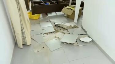 Força da água da chuva destrói chão em centro paroquial de Loulé