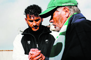 Luis Suárez com Arsénio Cruz, adepto do Sporting