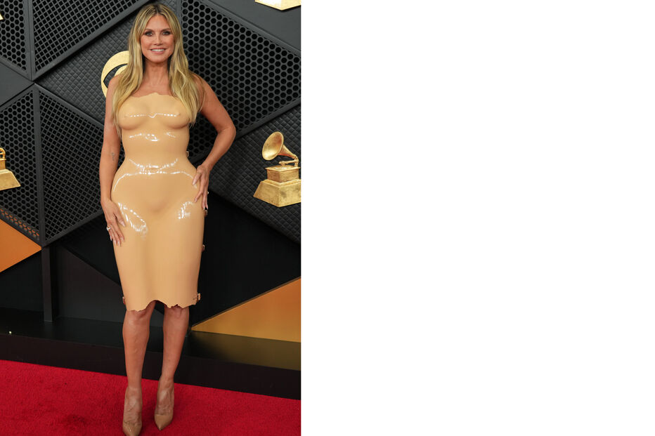 Heidi Klum marca presença num evento com um vestido que se destaca