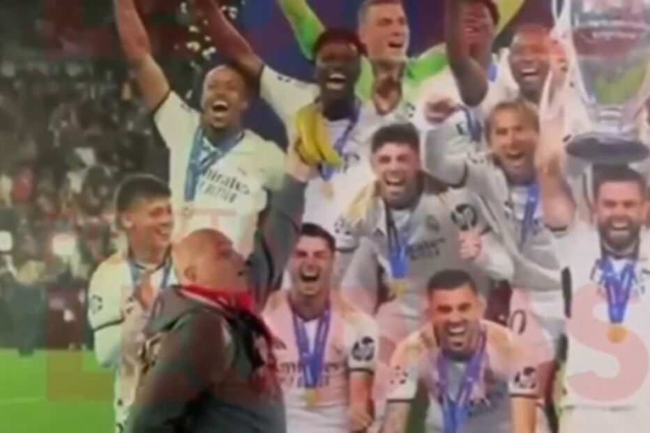 Adepto com cachecol do Benfica coloca bananas por cima de imagem de Vinícius Júnior