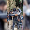 <![CDATA[ Gritos de euforia e lágrimas: O momento após o resgate do grupo preso há uma semana numa gruta inundada em Laos   ]]>