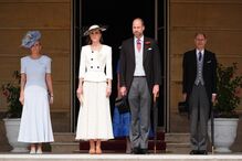 Kate, William e outros membros da realeza dão receção no jardim de Buckingham