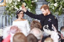 Harry e Meghan brindam no dia do seu casamento