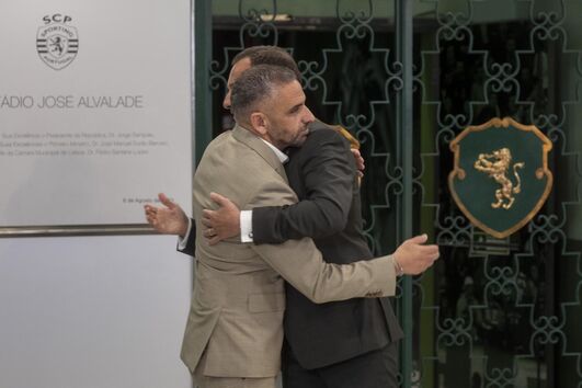 Treinador e presidente trocaram um abraço no fim do evento