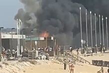 Incêndio deflagra em bar na praia do Dragão Vermelho na Costa da Caparica 