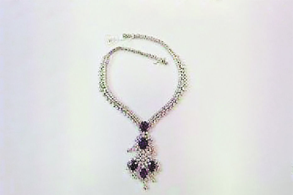 Colar de ouro branco com rubis e diamantes