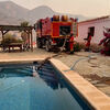 <![CDATA[ Bombeiros espanhóis abastecem em piscinas durante combate aos fogos na Andaluzia ]]>