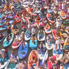 <![CDATA[ Centenas de pessoas enchem rio de Moscovo de cor num carnaval de paddle ]]>