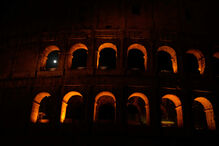 The moon sets behind the Colosseum during a partial lunar eclipse in Rome, Friday, Aug. 28, 2026. (AP Photo/Gregorio Borgia)