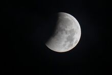 The beginning of a partial lunar eclipse is seen from