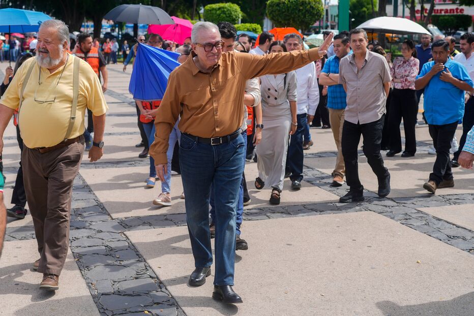 FILE - Sinaloa state Gov. Ruben Rocha waves as he takes part in an annual earthquake drill in Culiacan, Mexico,