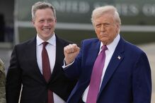 President Donald Trump gestures as Secretary of the U.S. Army