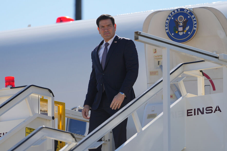 U.S. Secretary of State Marco Rubio steps off a plane Thursday, Oct. 8, 2026, at Lisbon Airport in Lisbon. (AP