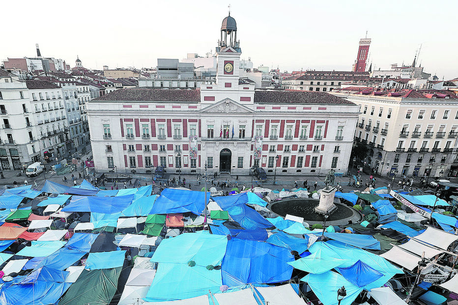 O monumental acampamento da Porta do Sol, montado por causa de Maricarmen, não vai terminar com a morte dela na última quarta-feira. Estava internada no hospital