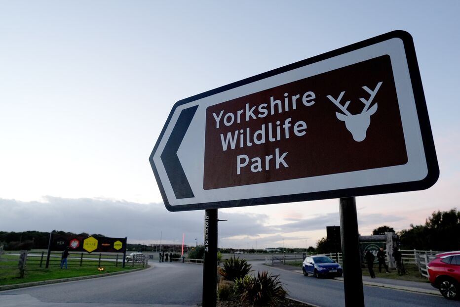 A sign marks athe entrance to Yorkshire Wildlife Park near Doncaster, England. (Annabel Lee-Ellis/PA via AP)