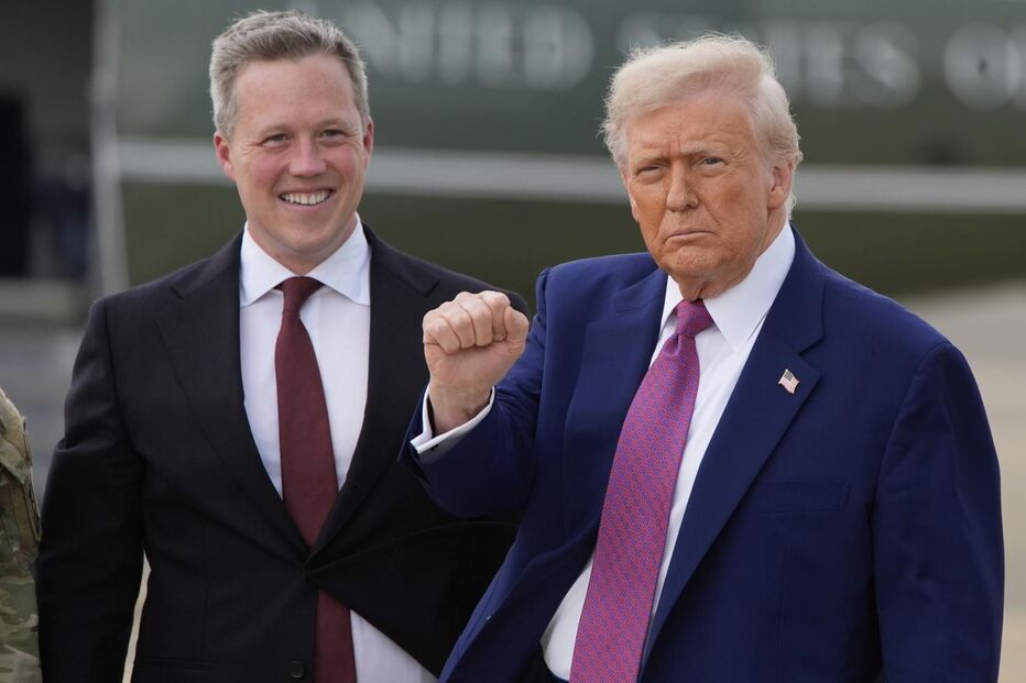 President Donald Trump gestures as Secretary of the U.S. Army